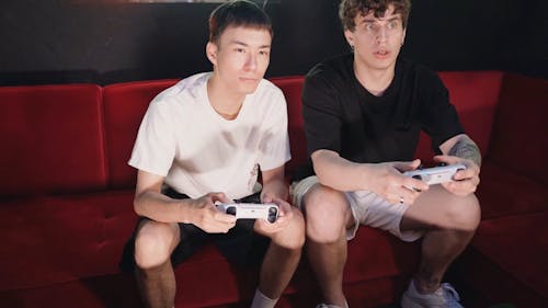 Competitive Men Playing Video Games