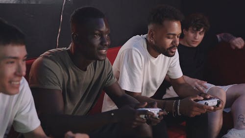 Men Playing Video Games Together