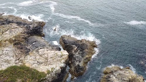 A Drone Footage of Rock Formations on the Sea