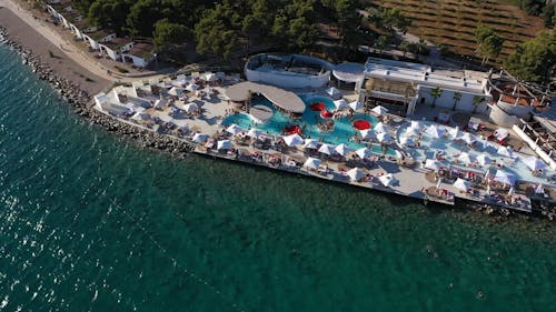 Drone Footage of People at a Beach Resort