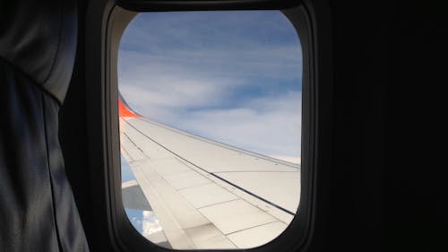 A Footage of The Sky From an Airplane Window