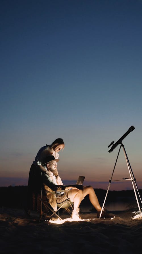 Couple Looking at the Laptop