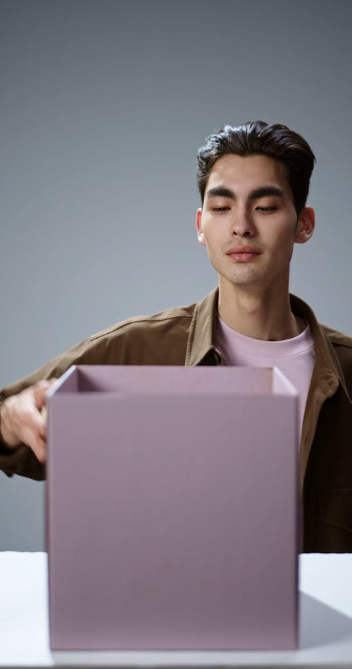 Man Preparing Boxes for Charity