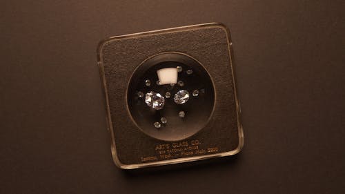 Pieces of Precious Diamond Karats on a Case