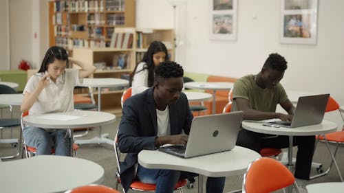 Students Studying Together in Classroom