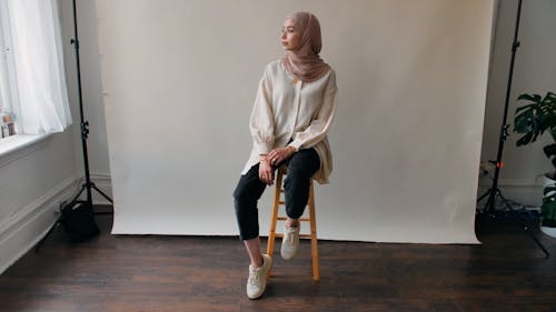 Woman Sitting on Chair