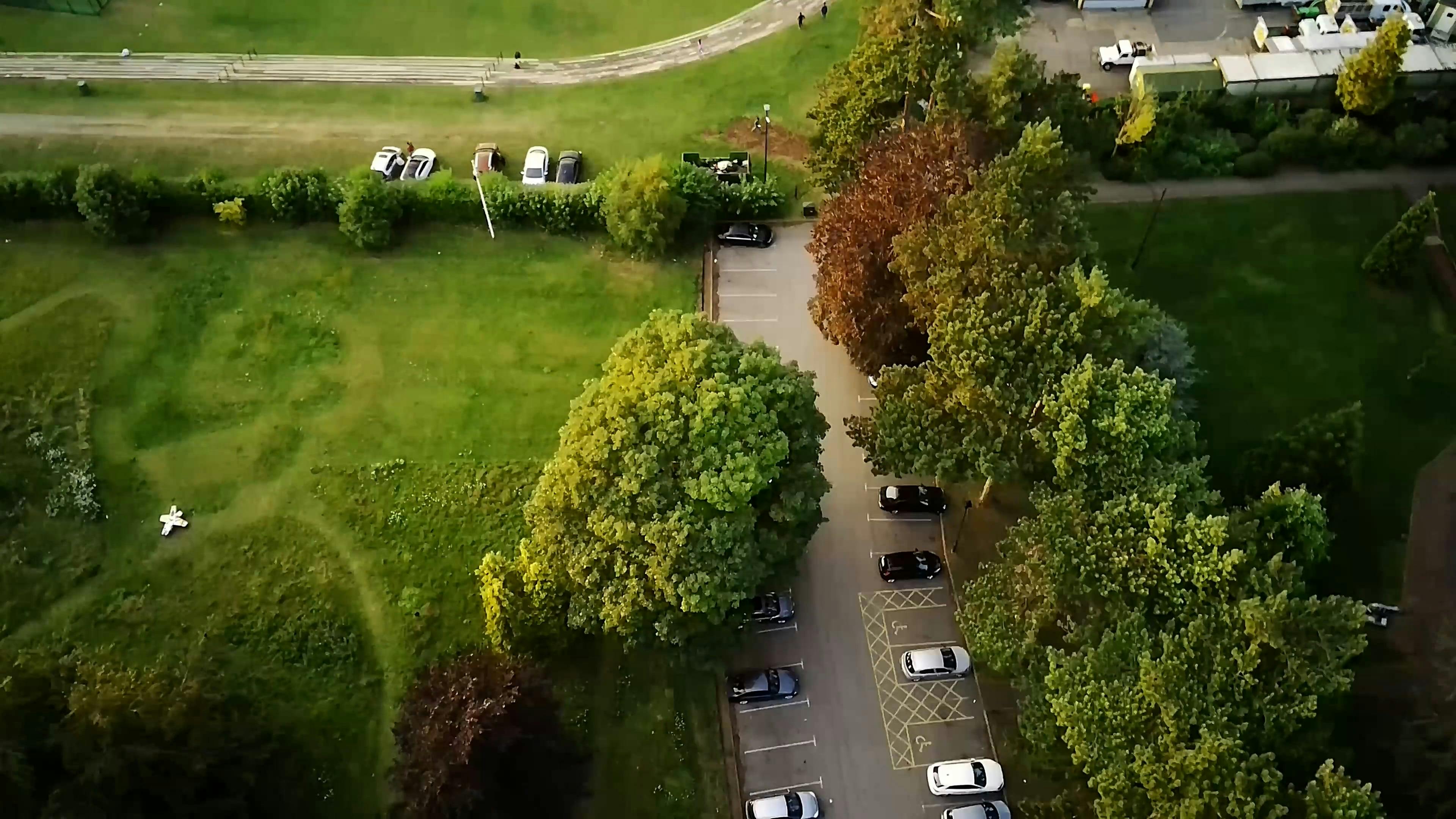 an aerial view of a parking lot with cars 9222237