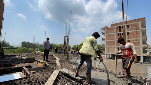 Time Lapse of Men Working at a Construction Site 