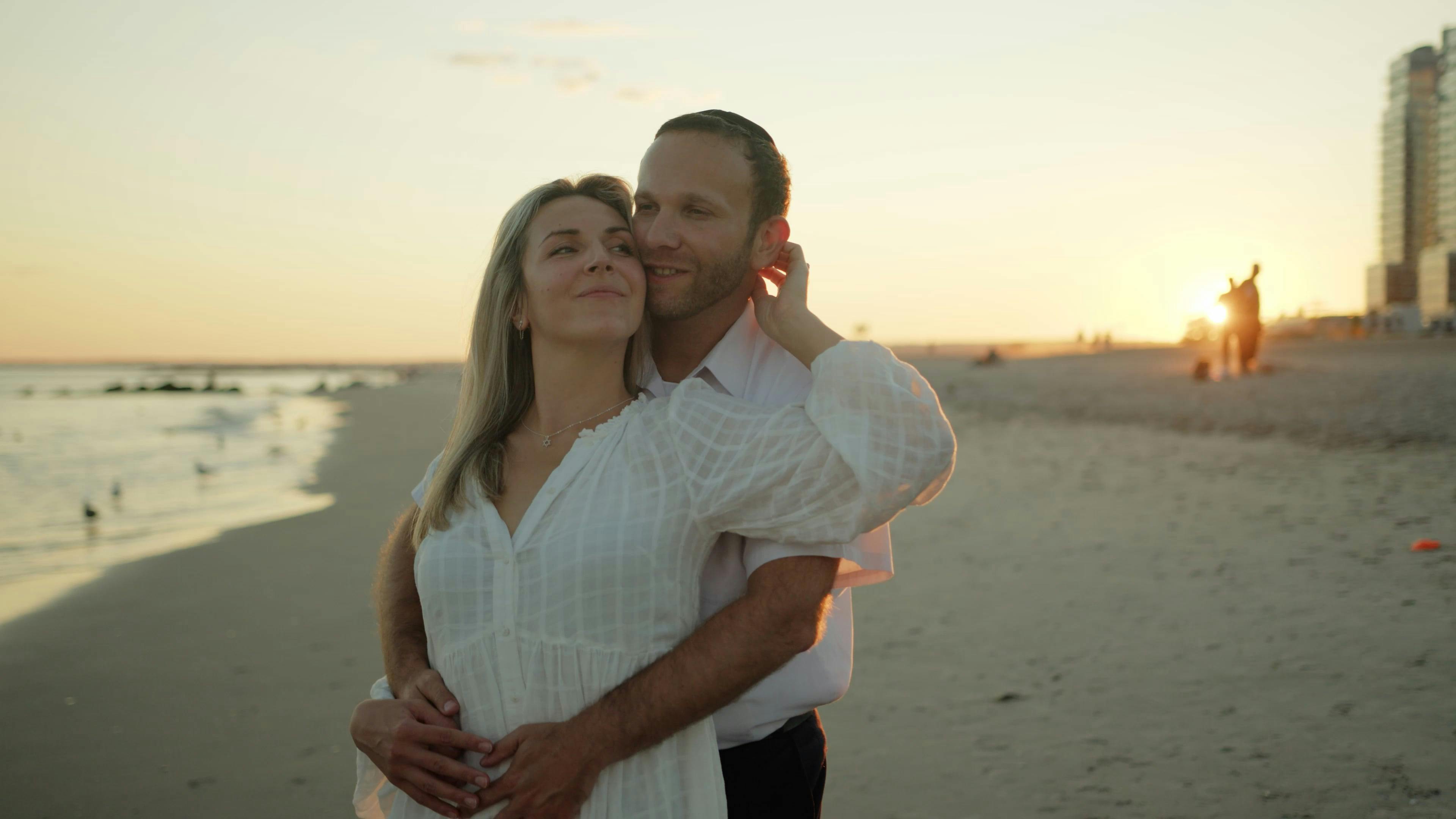 Man Hugging a Woman in the Beach Free Stock Video Footage, Royalty-Free ...