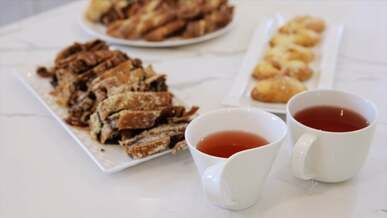 tea and variety of foods on the table