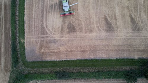 A Tractor Working on a Field