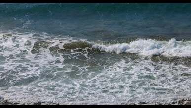 slow motion video of waves crashing