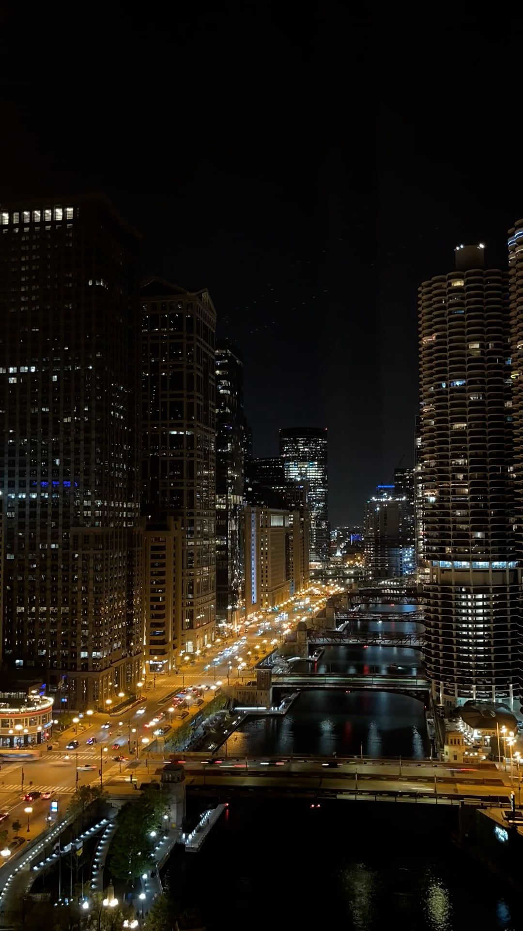 A city at night with a river running through it Free Stock Video ...