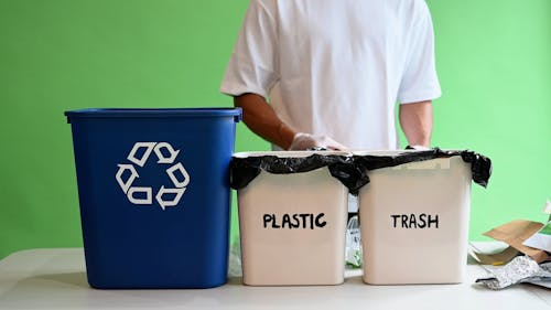 A Person Separating Recyclable Materials