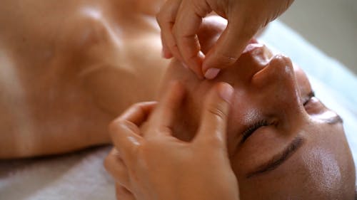 Woman Getting a Face Massage