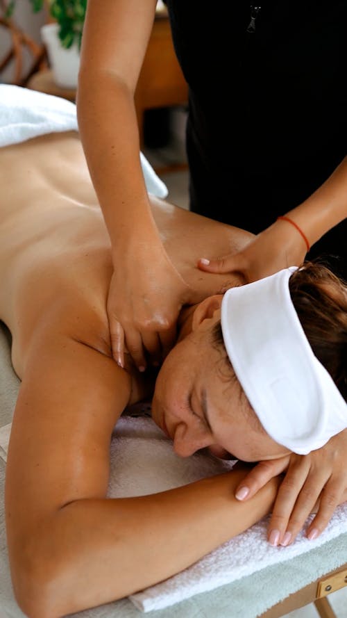 A Woman Having a Back Massage
