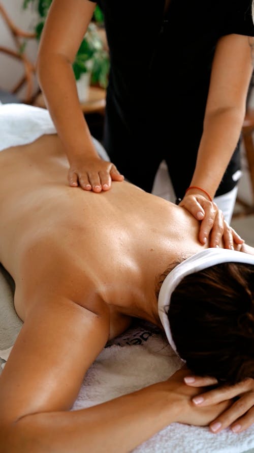 A Woman Getting a Back Massage