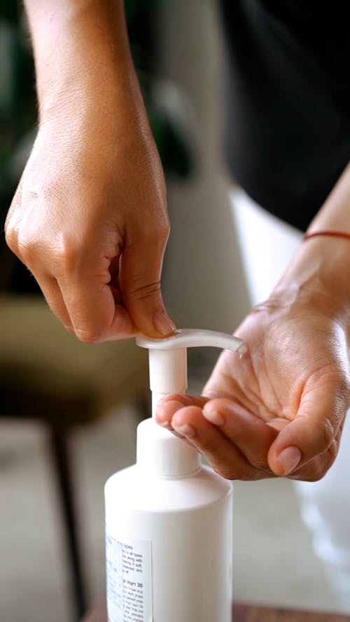Close up of a Person Dispensing Lotion