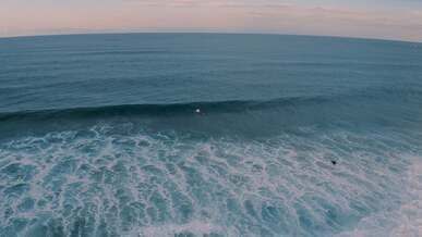 drone footage person surfing