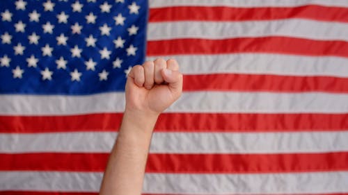 A Fist in Front of the American Flag 