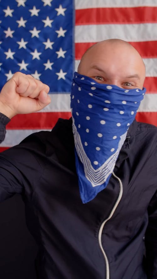 A Protester Waving His Clenched Fist