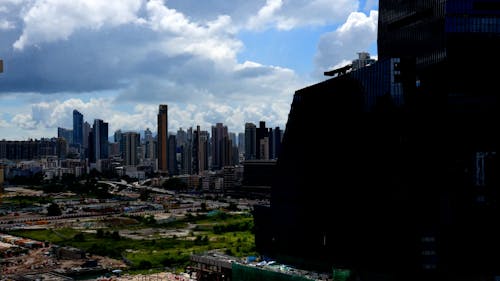 Moving Clouds above the City Skyline