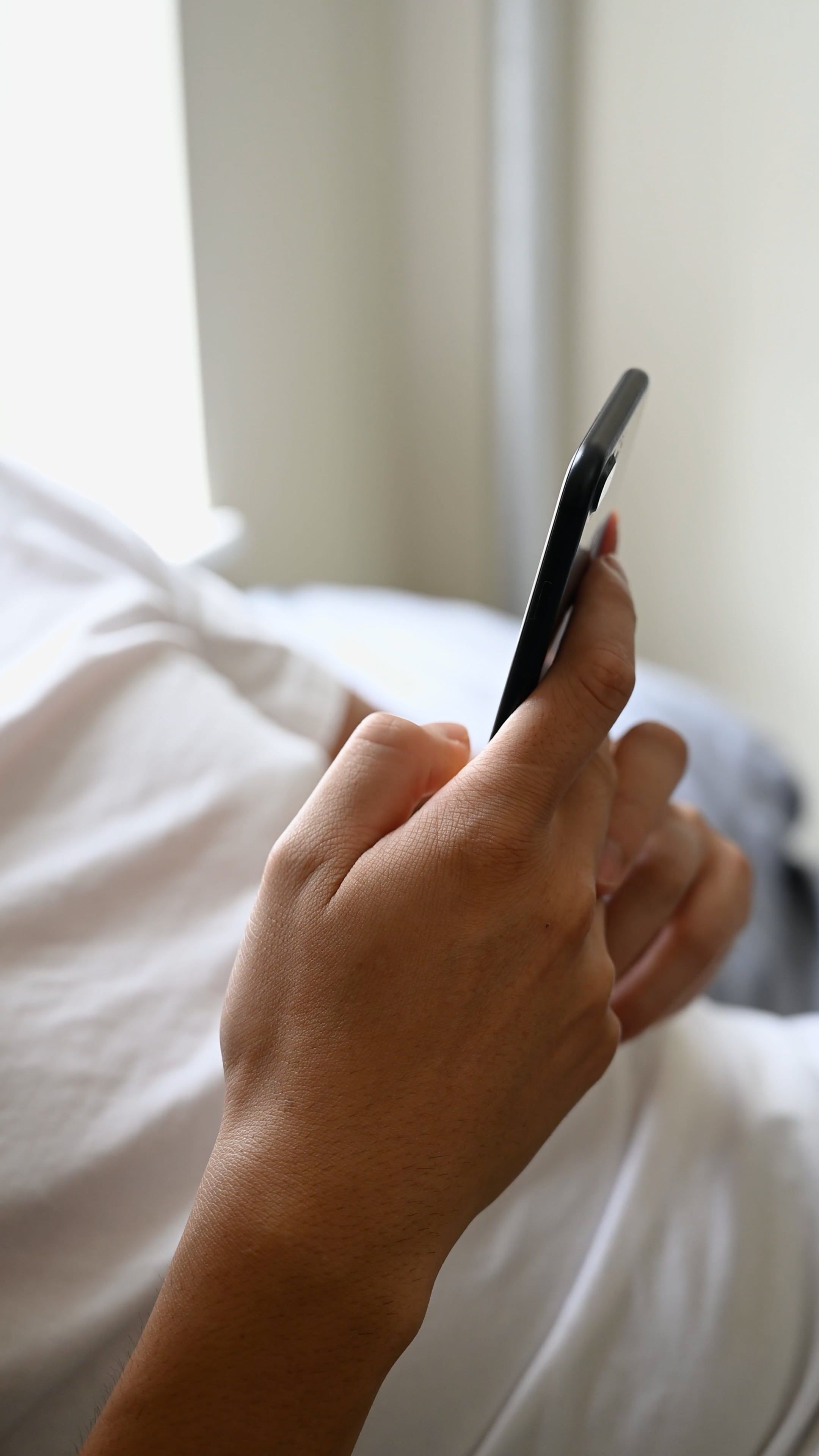 A man in a white shirt is using his cell phone Free Stock Video Footage ...