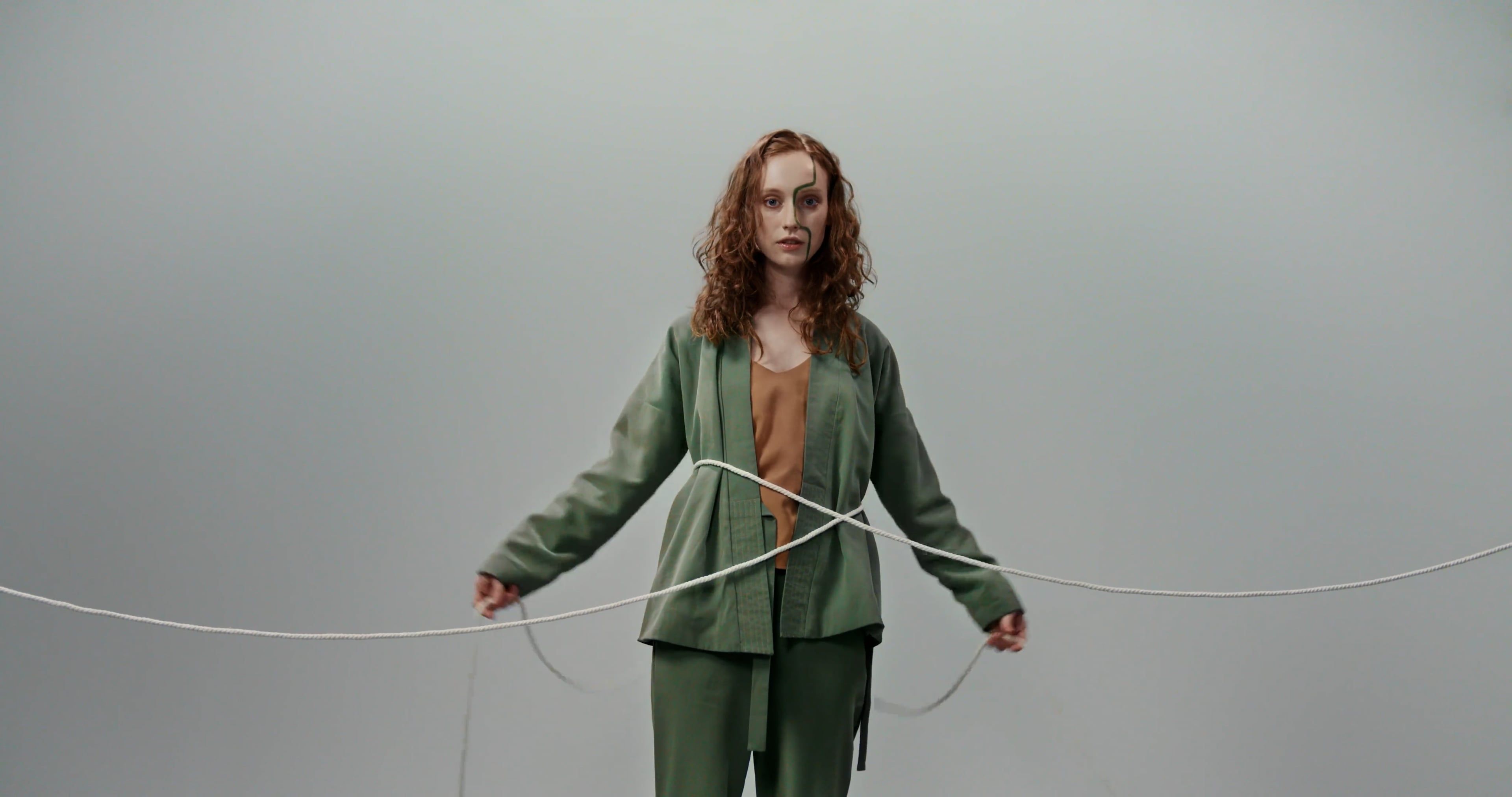Woman Putting White Rope Around Her Body Free Stock Video Footage ...
