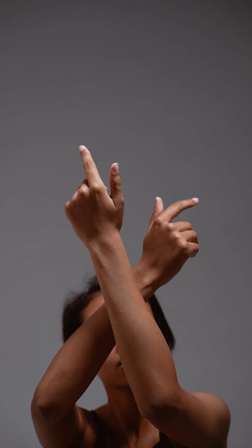 A Woman Raising Her Hands