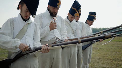 Revolutionary Soldiers Fixing their Rifles