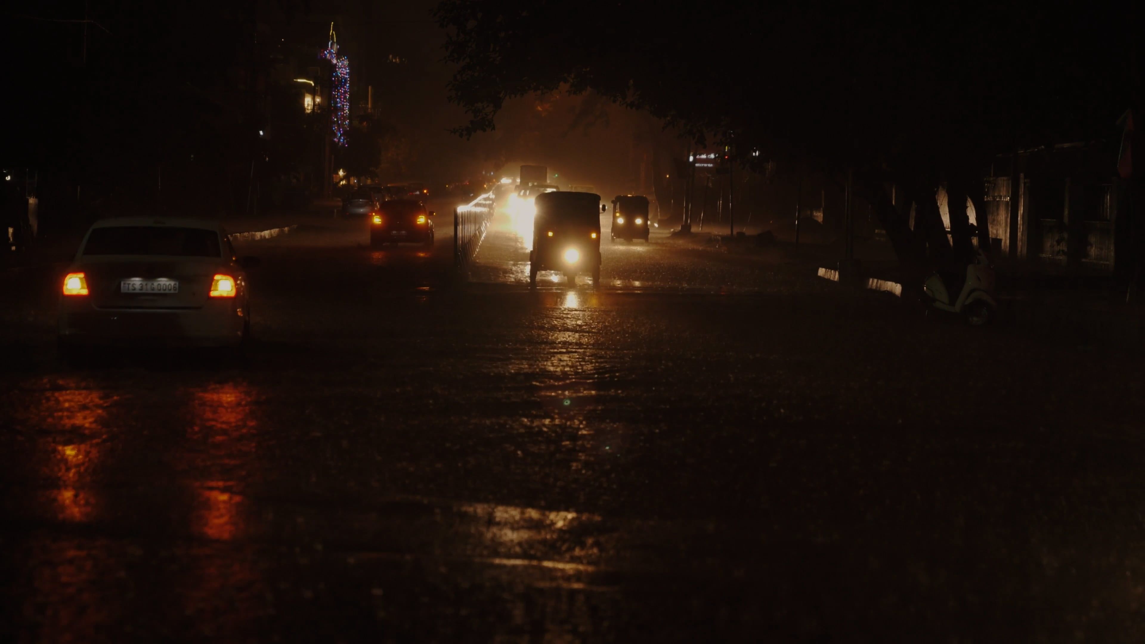 A car drives through a flooded street at night Free Stock Video Footage ...