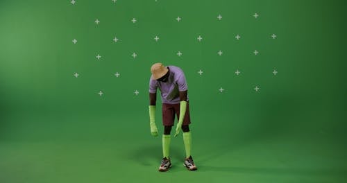 A Man with a Green Background