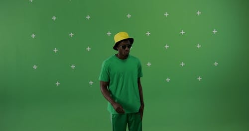 Man Wearing Green Shirt and Green Sunglasses