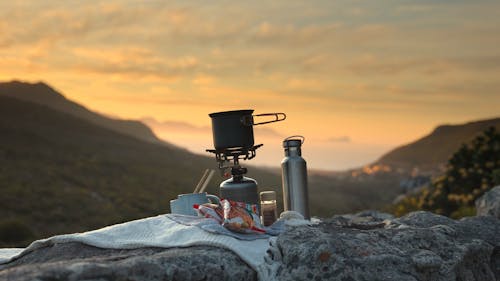A Cooking Equipment on a Mountain Rocks