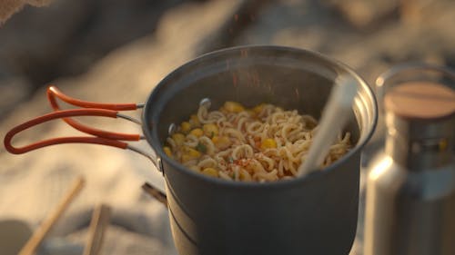 A Person Cooking Noodles