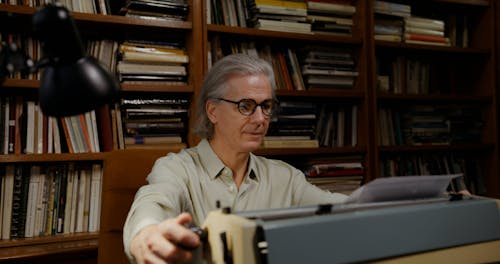 Man Using a Typewriter