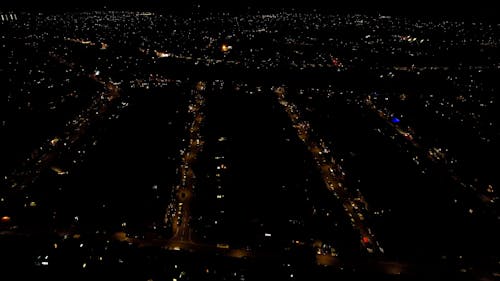 Drone shot of city at night