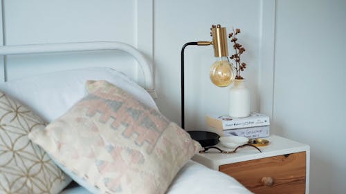 Lamp on a Side Table in a Bedroom
