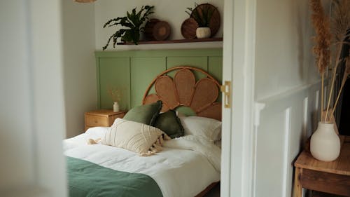 A Modern Bedroom with Wooden Drawers on the Side