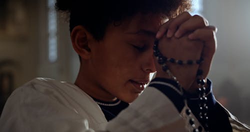 Video of a Boy Praying 