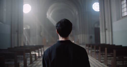 Man Walking Towards the Altar