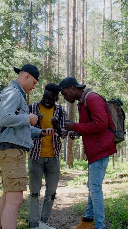 A Group of Men Talking About Directions