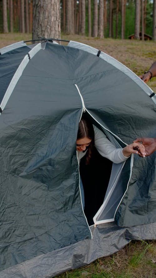 Friends Standing Near the Tent