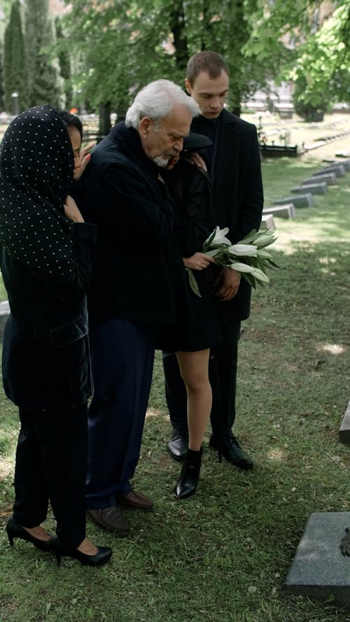 Family Grieving at the Cemetery