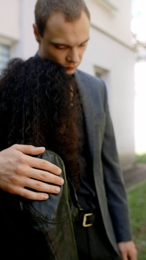 Man Comforting a Woman