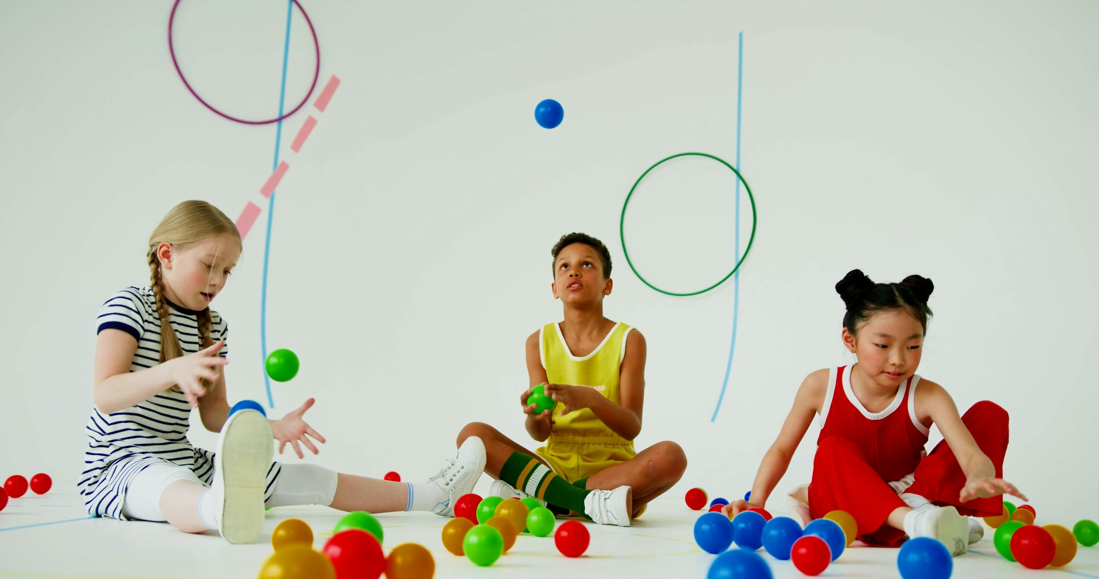 Kids Playing Colorful Plastic Balls · Free Stock Video