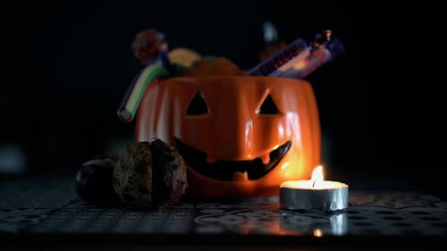 A Halloween Pumpkin and a Candle