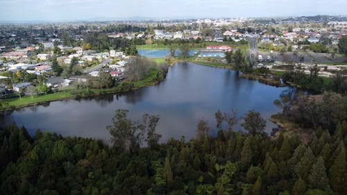 Drone footage of lake and town