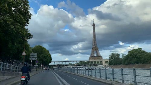 A Time-Lapse Video of a Moving Car with an Eiffel Tower View