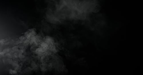 Soft smoke against black background